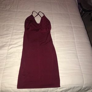 Burgundy colored dress.